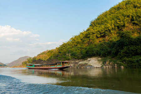 Beautiful landscape taken during two day cruise on Mekong River from Huay Xai via Pakbeng to Luang Prabang in Laos. Touristic trip trough south east Asia.の写真素材