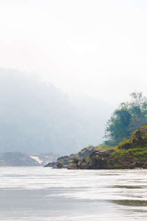 Beautiful landscape taken during two day cruise on Mekong River from Huay Xai via Pakbeng to Luang Prabang in Laos. Touristic trip trough south east Asia.の写真素材