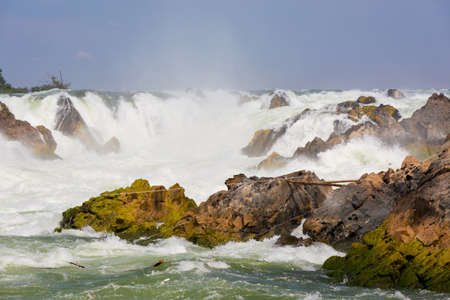 Big Khone Phapheng waterfall - don phapheng, don khong, si phan don on four thousand islands in Laos. Landscape of nature in south east asia during summer.の写真素材
