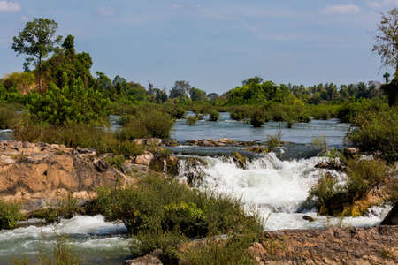 Big Li Phi waterfall in Laos - Tat Somphamit, don khone, si phan don on four thousand islands in Laos. Landscape of nature in south east asia during summer.の写真素材