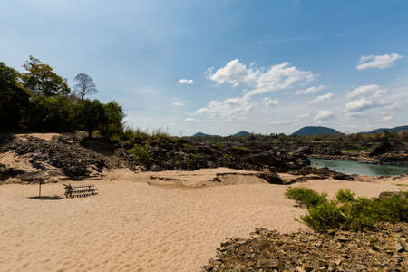 Surroundings of big Li Phi waterfall in Laos - Tat Somphamit, don khone, si phan don on four thousand islands in Laos. Landscape of nature in south east asia during summer.の写真素材
