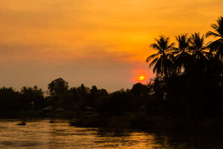 Don Khone islands in south Laos. Landscape of nature taken on four thousands islands on Mekhong river in south east asia during summer sunset.の写真素材