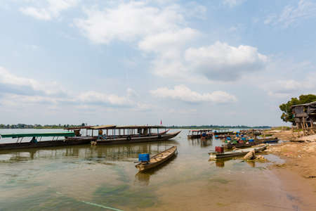 Boats on Don Det island in south Laosの写真素材