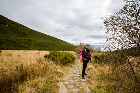 Beautiful Velicka valley - in slovakian High Tatra mountains. Beautiful panorama with autumn and winter together - path from Sliezsky Dom to Polsky Hreben (Polski Grzebien)の写真素材