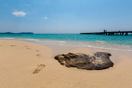 Summer landscape on tropical Koh Kood island in Thailand. Footprints on sand and landscape with sea taken from Ao Tapao beach.の写真素材