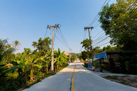Summer landscape with main road on tropical koh Kood island in Thailand. Panorama taken on Klong Chao bay.のeditorial素材