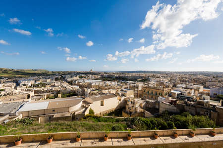 Victoria capital city of Gozo island seen from Citadella castle. Historical architecture of Malta.の写真素材