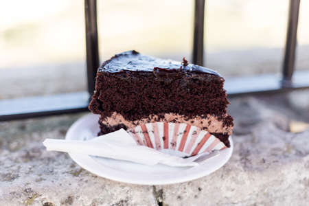 Traditional sweet chocolate sponge cake with cream served in local restaurant. Delicious maltese cuisineの写真素材