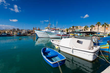 Colorful touristic landscape of Port in Marsaxlokk on Malta island. Beautiful seascape in south Europe.の写真素材