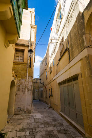 Sandstone architecture of Victoria capital city of Gozo island. Historical architecture of Malta.の写真素材