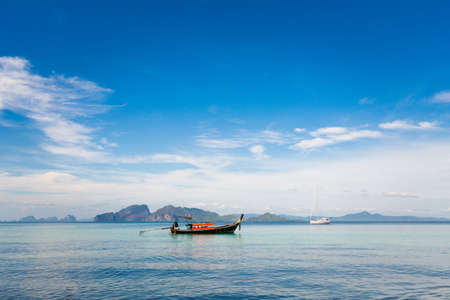 Longtail boat on tropical koh Kradan island  in Thailand. Landscape taken on main long sunrise beach...