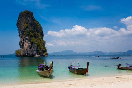Longtail boat on tropical koh Poda island in Thailand. Landscape taken in national park in south east Asia.の写真素材