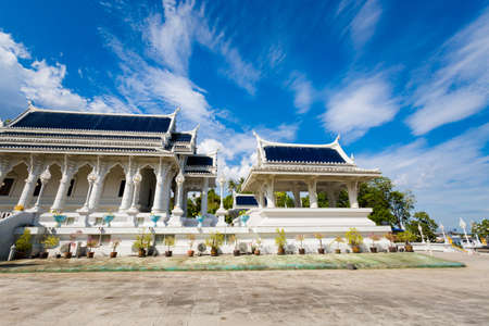 Beautiful buddhist Wat Kaewkorawaram temple in Krabi in southern Thailand. Cityscape with beautiful religion architecture in south east Asia.の写真素材