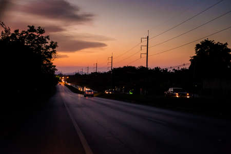 View on main road in Krabi in southern Thailand. Landscape taken during sunset in south east Asia.