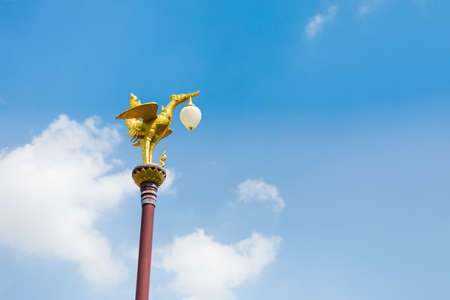 Gold Lamp birdshape latern on Koh Kret island on Menam river in Bangkok. Holiday in south east Asia.の写真素材