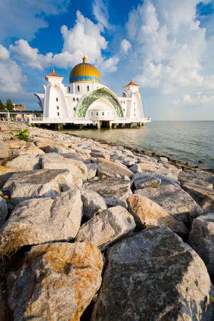 Beautiful architecture of Melaka Straits Mosque in Malacca city in Malaysia. Beautiful sacral building in south east Asia.の写真素材
