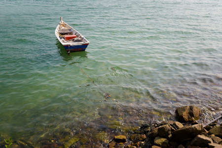 Pangkor island landscape with fishing boat in Malaysia. Beautiful seascape and harbor taken in south east Asia.の写真素材