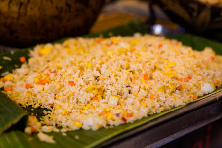 Fresh prepared tofu with eggs fried rice on local market in Bangkok. Traditional thai cuisine made of fresh ingredients.の写真素材