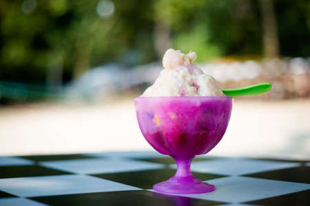 Fresh prepared malaysian ice dessert ABC in local restaurant on Pangkor island. Traditional asian cuisine made of fresh ingredients.の写真素材