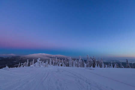 Beautiful panorama taken in polish mountains Beskidy on the way to Rysianka during snowy winter....