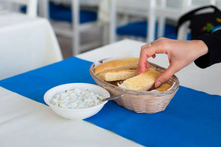 Fres pita served with tzatziki in local restaurant in Larnaca. Traditional cypriot food on Cyprus...