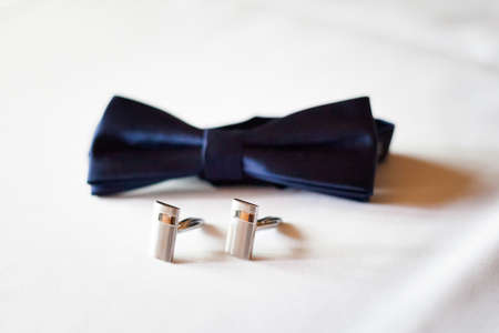 Beautiful bow tie and cuff links of the Groom before wedding - romantic detailの写真素材