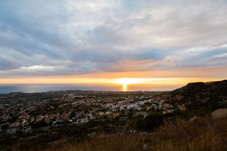 Beautiful panorama from hill with Paphos during sunset. Landscape taken on Cyprus island.の写真素材