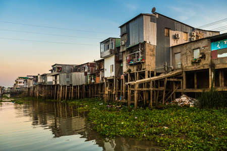 Summer cityscape in tropical Chau Doc, heart of Mekong Delta, Vietnam. Landscape taken from the cityの写真素材