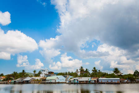 Local houses on beautiful wild Cua Can beach, tropical Phu Quoc island in Vietnam. Landscape taken during sunny day in fishermans village.のeditorial素材