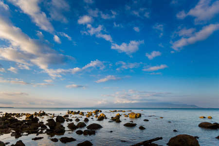Fishermen during work on tropical Phu Quoc island, Bai Thom area in Vietnam. Landscape taken on Hon...