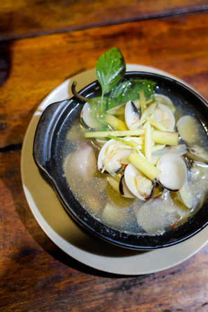 Delicious fresh prepared mussels, Chip Chip clams. Traditional vietnamese cuisine served in harbour restaurant on Phu Quoc, Vietnam.の写真素材