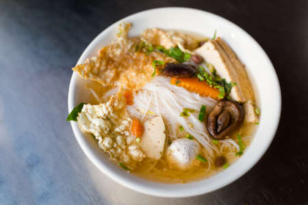 Delicious vegetarian bun chay soup. Traditional vietnamese cuisine served in restaurant in Can Tho, Vietnam.の写真素材