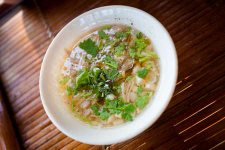 Delicious fresh prepared vegan mushroom soup. Vegetarian vietnamese cuisine served in local...