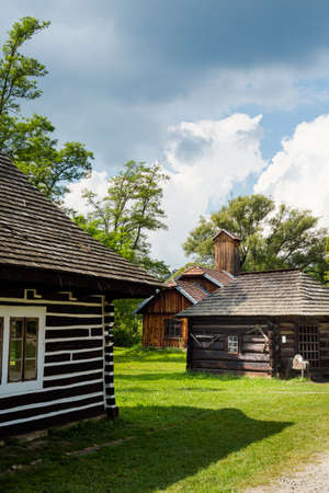 Sanok Poland - 28.08.2020 - View at the Wooden houses of Rural Architecture Museum in Sanok. 
Beautiful landscape photo of the biggest open-air museums in Poland taken during summer,のeditorial素材