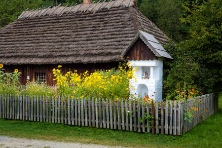 Sanok Poland - 28.08.2020 - View at the Wooden houses of Rural Architecture Museum in Sanok. 
Beautiful landscape photo of the biggest open-air museums in Poland taken during summer,のeditorial素材