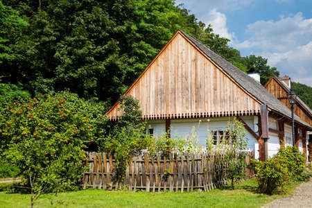 Sanok Poland - 28.08.2020 - View at the Wooden houses of Rural Architecture Museum in Sanok. Beautiful landscape photo of the biggest open-air museums in Poland taken during summer,のeditorial素材