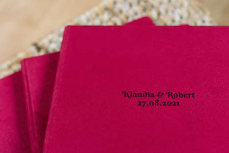 Closeup of exclusive photobook covered with velvet textile. Wedding photo album detail Education concept.の写真素材