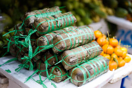 Delicious colorful local food ricecakes on the market. Traditional vietnamese cuisine in Ho Chi...