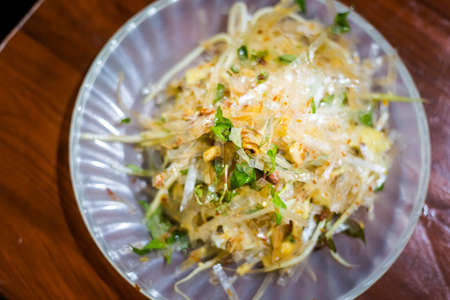 Delicious rice paper salad Banh Trang Tron. Traditional vietnamese cuisine served in restaurant in...