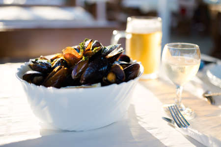 Delicious colorful local food fresh cooked mussels in a restaurant. Traditional bulgarian cuisine in...