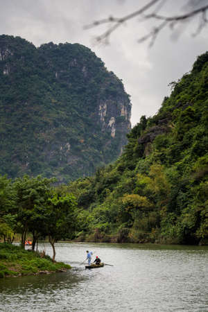 Tam Coc, Vietnam - March 2020: Beautiful landscape in Ninh Binh, Vietnam. Rural scenery photo taken in south east Asia.のeditorial素材