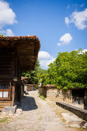 Summer landmark photo of old and authentic bulgarian Zheravna village. Landscape with blue sky in Bulgariaのeditorial素材