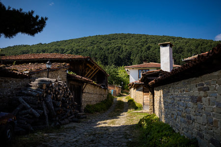 Summer landmark photo of old and authentic bulgarian Zheravna village. Landscape with blue sky in Bulgariaのeditorial素材