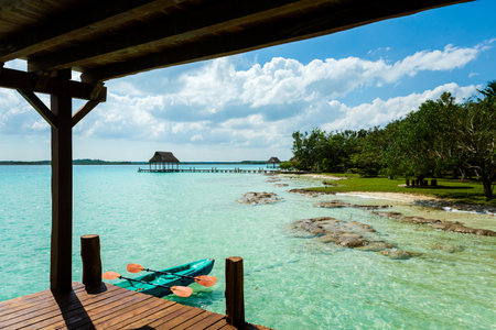 Beautiful landscape - wooden pier in Laguna Bacalar in Mexico during kayak trip.の写真素材