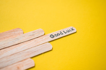 stick of ice cream with the words good luck. Motivational quotes, optimism, positive words. Isolated on backgroundの写真素材