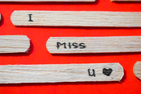stick of ice cream with the words I Miss You. Romance quotes, optimism, positive words. Isolated on...