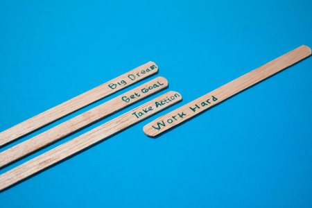 stick of ice cream with the words Big dream, Get goal, Take action, Work hard. Motivational quotes, optimism, positive words. Isolated on backgroundの写真素材