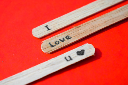 stick of ice cream with the words I Love You. Romance quotes, optimism, positive words. Isolated on backgroundの写真素材