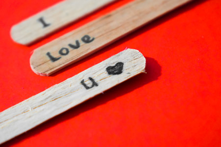 stick of ice cream with the words I Love You. Romance quotes, optimism, positive words. Isolated on backgroundの写真素材