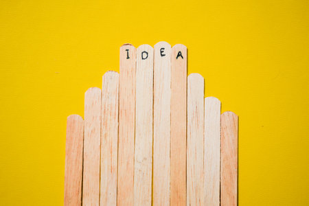 stick of ice cream with the words Idea. Motivational quotes, optimism, positive words. Isolated on backgroundの写真素材